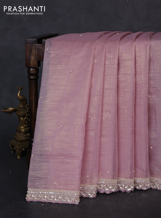 Crush tissue saree pastel pink with beaded work buttas and sequin embroidery pallu & border