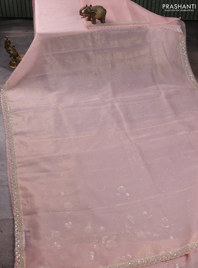 Crush tissue saree mild peach with beaded work buttas and sequin embroidery pallu & border