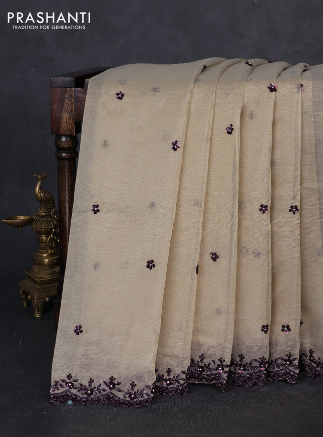 Crush tissue saree beige with sequin embroidery buttas and sequin embroidery pallu & border