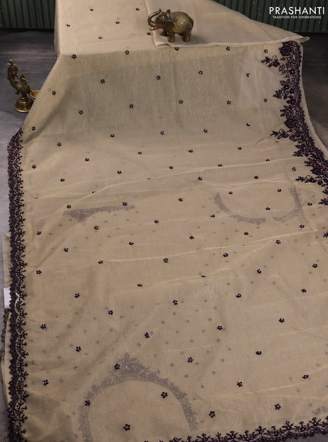 Crush tissue saree beige with sequin embroidery buttas and sequin embroidery pallu & border
