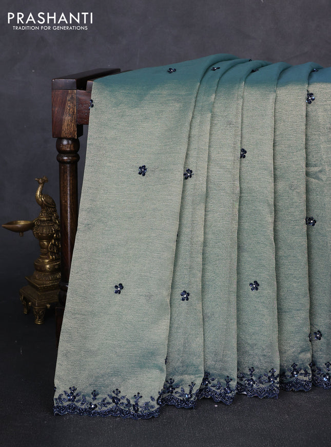 Crush tissue saree pastel blue with sequin embroidery buttas and sequin embroidery pallu & border