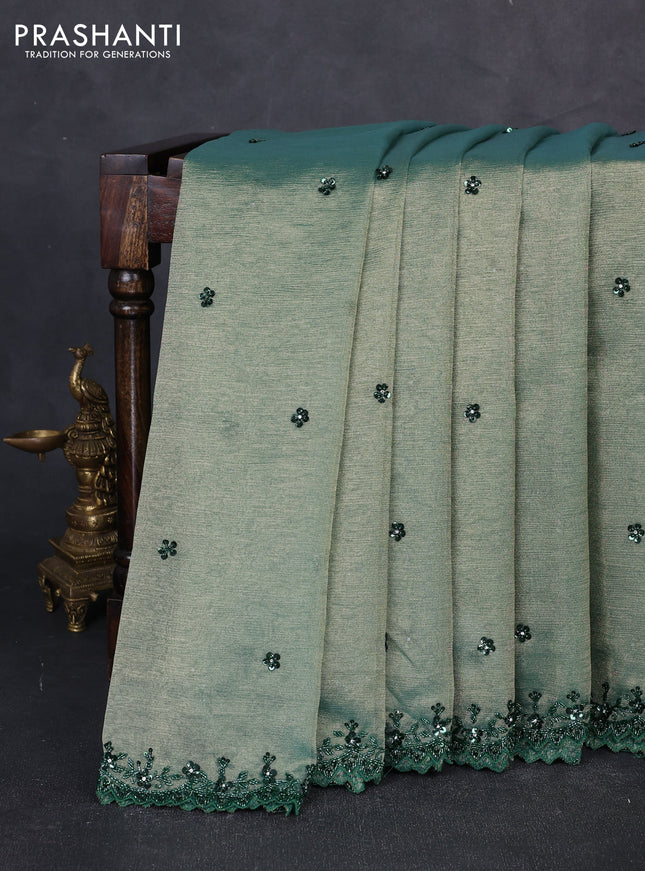 Crush tissue saree green with sequin embroidery buttas and sequin embroidery pallu & border