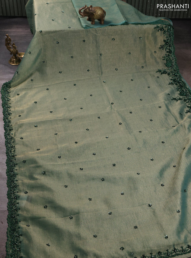 Crush tissue saree green with sequin embroidery buttas and sequin embroidery pallu & border