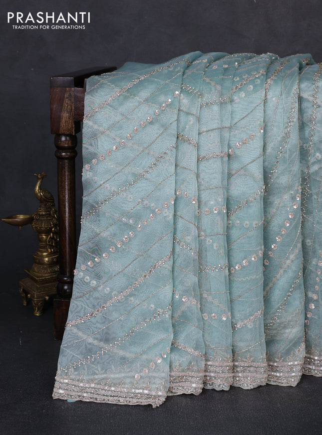 Organza saree teal shade with allover sequin embroidery work