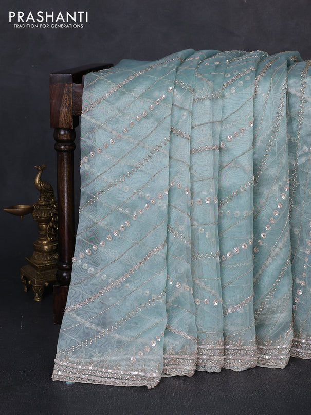 Organza saree teal shade with allover sequin embroidery work