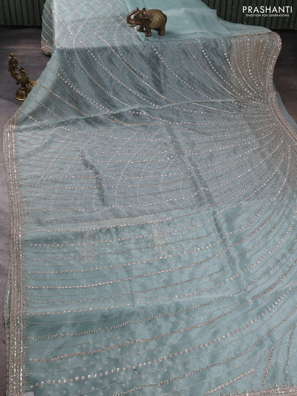 Organza saree teal shade with allover sequin embroidery work
