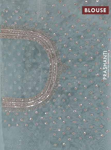 Organza saree teal shade with allover sequin embroidery work