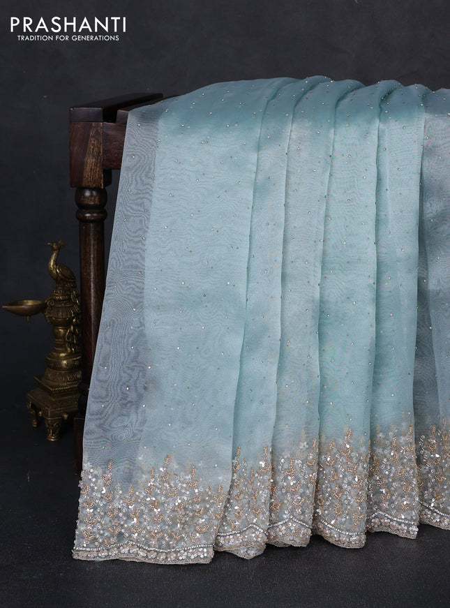 Crush tissue saree light blue with allover stone work and sequin embroidery pallu & border