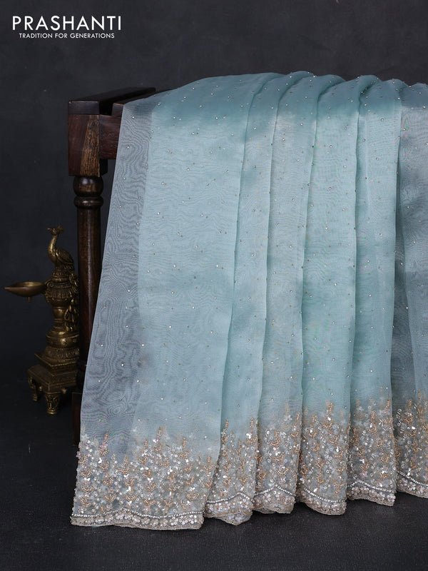Crush tissue saree light blue with allover stone work and sequin embroidery pallu & border