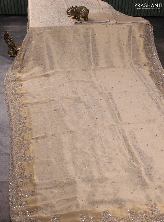 Banarasi silk saree beige with allover zari woven brocade weaves & sequin work and sequin embroidery work pallu & border