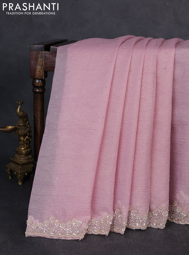 Crush tissue saree pastel pink with allover stone work and sequin embroidery pallu & border