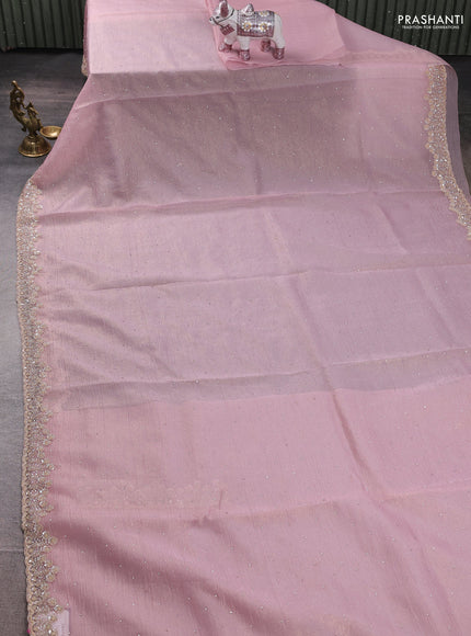 Crush tissue saree pastel pink with allover stone work and sequin embroidery pallu & border