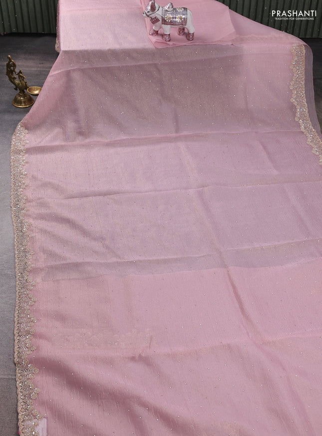 Crush tissue saree pastel pink with allover stone work and sequin embroidery pallu & border