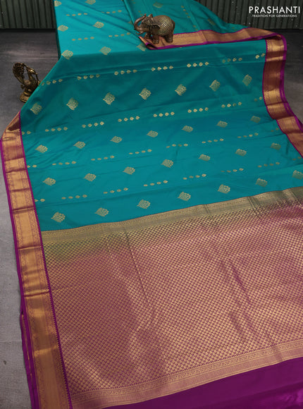 Semi kanchipuram silk saree teal green and purple with zari woven buttas and zari woven border