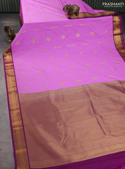 Semi kanchipuram silk saree lotus pink and pink with zari woven buttas and zari woven border
