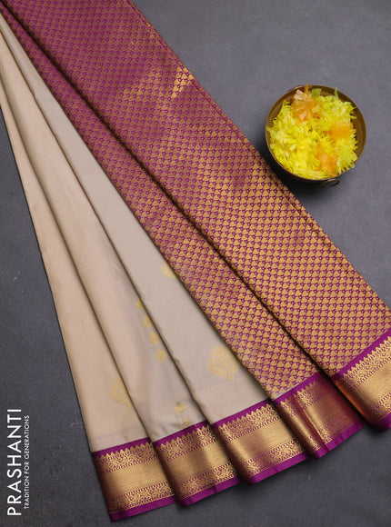 Semi kanchipuram silk saree beige and purple with zari woven buttas and zari woven korvai border