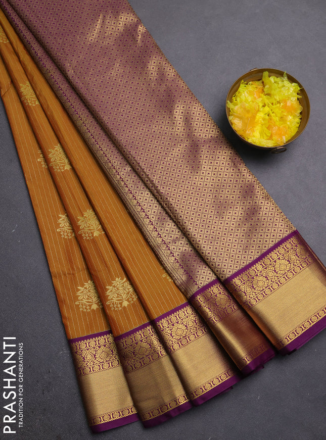 Semi kanchipuram silk saree dark mustard and purple with allover zari weaves & buttas and zari woven border