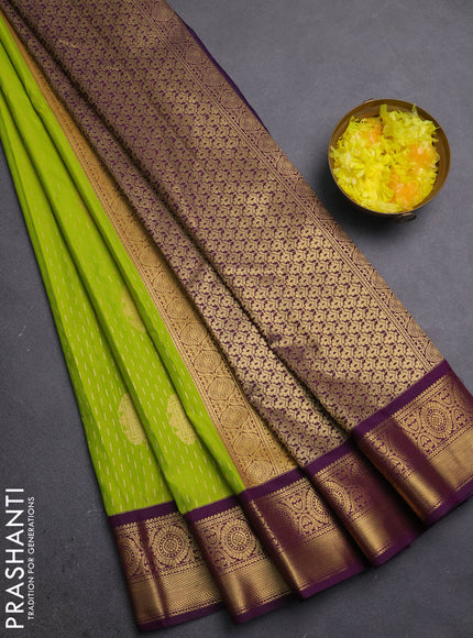Semi kanchipuram silk saree lime green and purple with allover zari weaves & buttas and zari woven korvai border