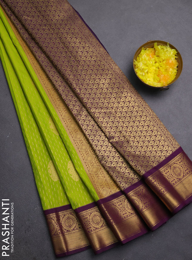Semi kanchipuram silk saree lime green and purple with allover zari weaves & buttas and zari woven korvai border