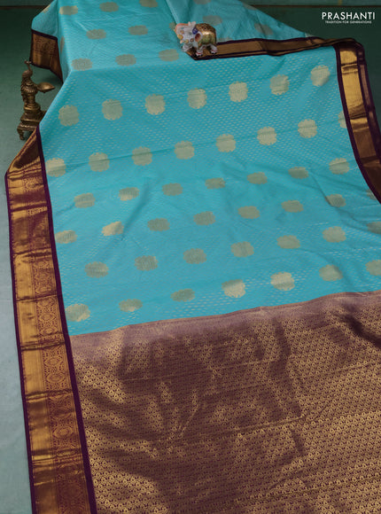 Semi kanchipuram silk saree teal blue and purple with allover zari weaves & buttas and zari woven korvai border