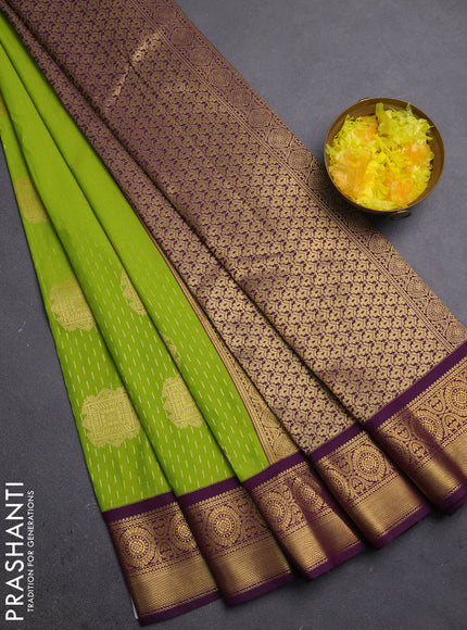 Semi kanchipuram silk saree lime green and purple with allover zari weaves & buttas and zari woven korvai border