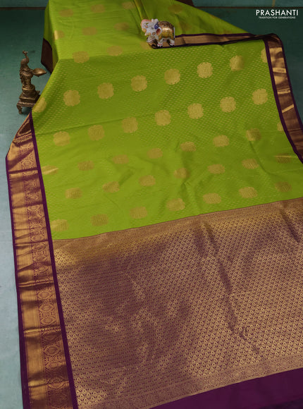 Semi kanchipuram silk saree lime green and purple with allover zari weaves & buttas and zari woven korvai border