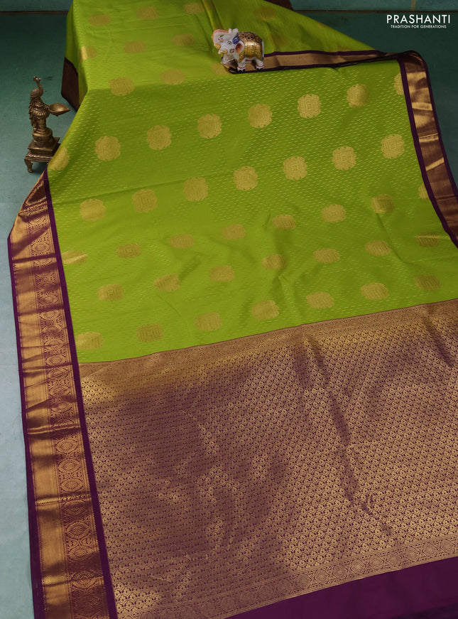 Semi kanchipuram silk saree lime green and purple with allover zari weaves & buttas and zari woven korvai border