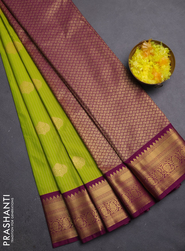Semi kanchipuram silk saree lime green and purple with allover zari weaves & buttas and zari woven korvai border