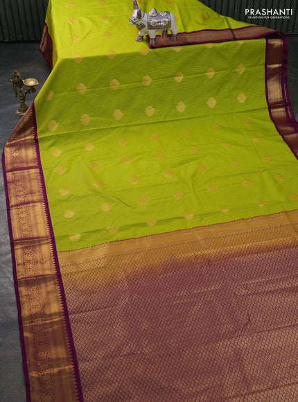 Semi kanchipuram silk saree lime green and purple with allover zari weaves & buttas and zari woven korvai border