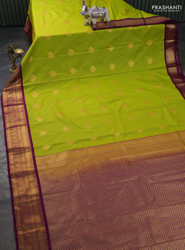 Semi kanchipuram silk saree lime green and purple with allover zari weaves & buttas and zari woven korvai border