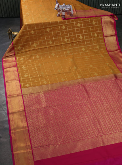 Semi kanchipuram silk saree mustard yellow and pink with allover zari checks & buttas and zari woven border