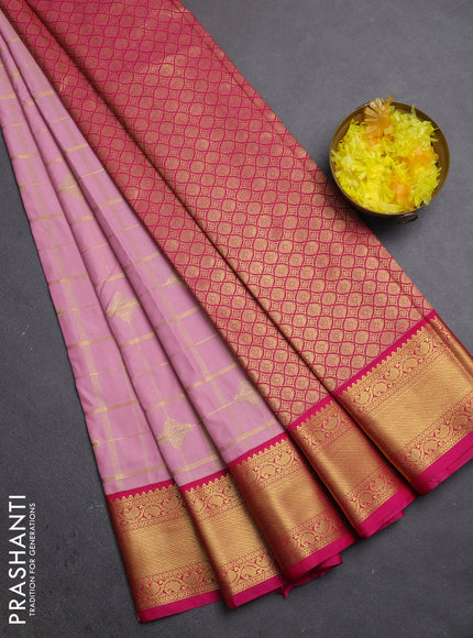 Semi kanchipuram silk saree peach pink and pink with allover zari checks & buttas and zari woven border
