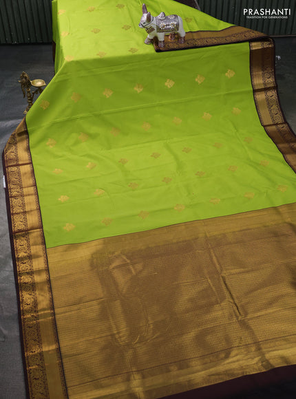 Semi kanchipuram silk saree light green and coffee brown with zari woven buttas and zari woven korvai border