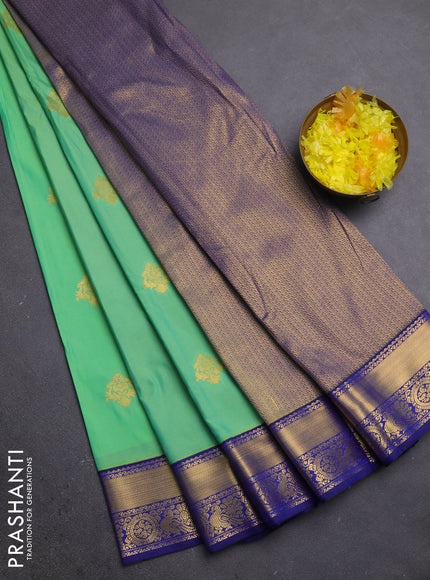 Semi kanchipuram silk saree teal green and blue with zari woven buttas and zari woven korvai border