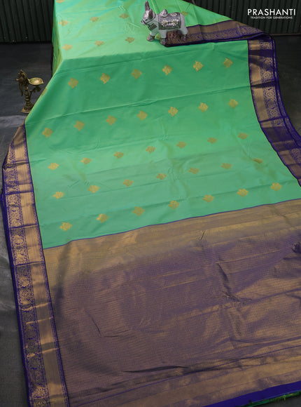 Semi kanchipuram silk saree teal green and blue with zari woven buttas and zari woven korvai border