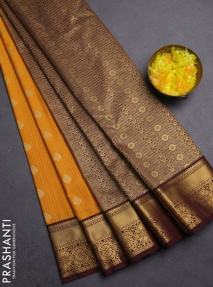 Semi kanchipuram silk saree mustard yellow and coffee brown with allover zari weaves & buttas and zari woven korvai border