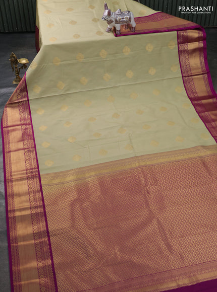 Semi kanchipuram silk saree pista green and magenta pink with allover zari weaves & buttas and zari woven korvai border