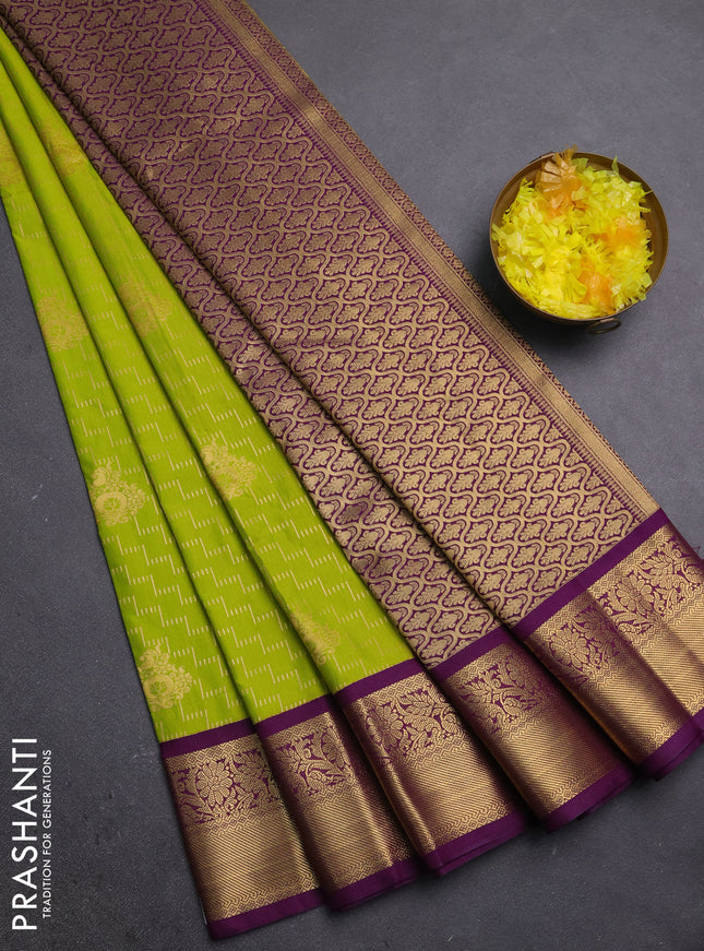 Semi kanchipuram silk saree lime green and purple with allover zari weaves & buttas and zari woven korvai border
