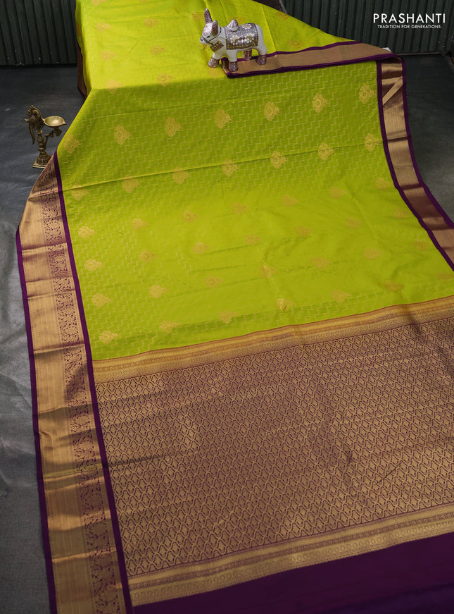 Semi kanchipuram silk saree lime green and purple with allover zari weaves & buttas and zari woven korvai border