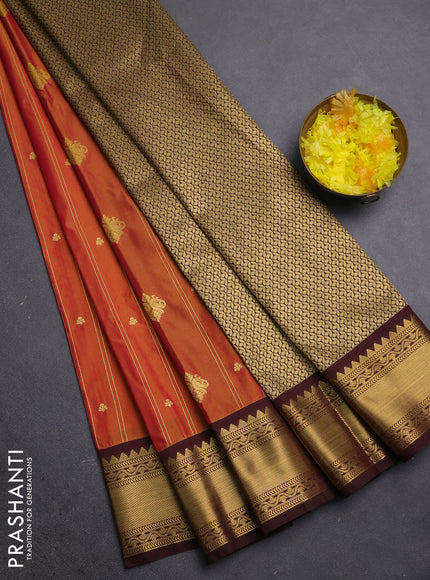 Semi kanchipuram silk saree dual shade of ruat shade and coffee brown with allover zari stripe & buttas and zari woven korvai border