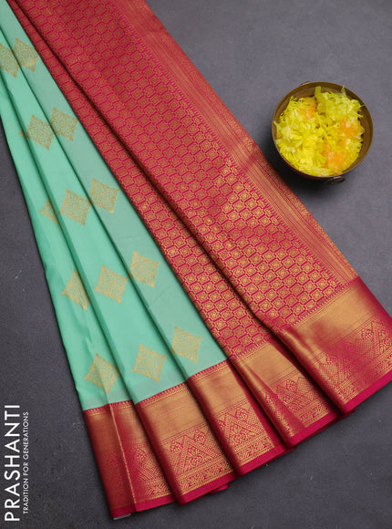 Semi kanchipuram silk saree teal green and pink with zari woven buttas and zari woven border