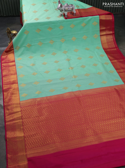 Semi kanchipuram silk saree teal green and pink with zari woven buttas and zari woven border