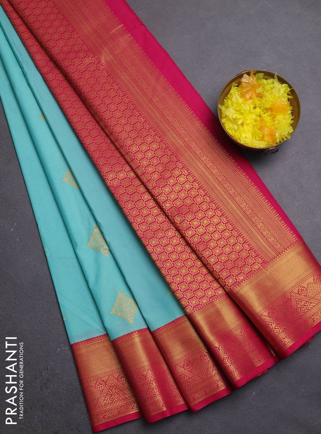 Semi kanchipuram silk saree teal green and pink with zari woven buttas and zari woven border