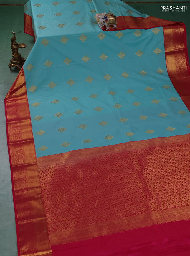 Semi kanchipuram silk saree teal green and pink with zari woven buttas and zari woven border