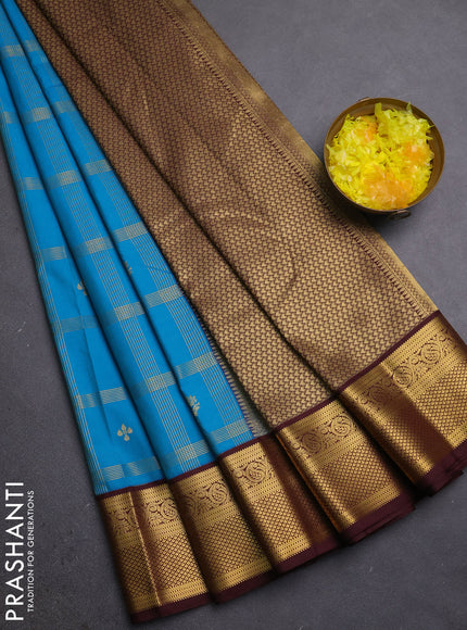 Semi kanchipuram silk saree peacock blue and coffee brown with allover zari checks & buttas and zari woven border