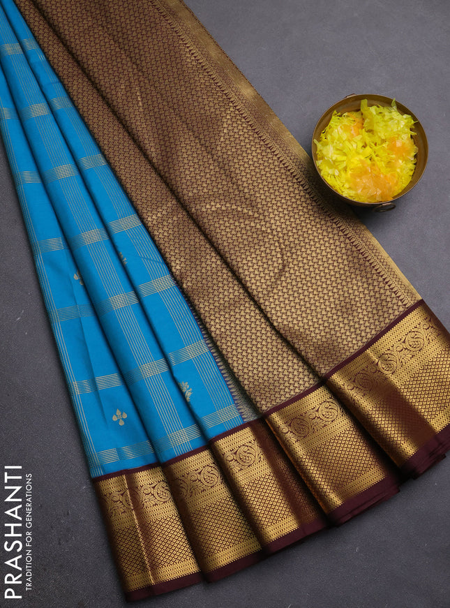 Semi kanchipuram silk saree peacock blue and coffee brown with allover zari checks & buttas and zari woven border