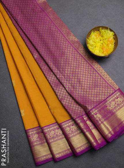 Semi kanchipuram silk saree mustard yellow and pink with zari woven buttas and zari woven border