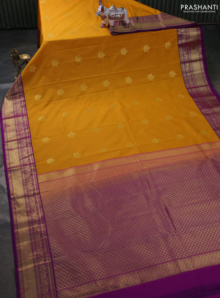 Semi kanchipuram silk saree mustard yellow and pink with zari woven buttas and zari woven border