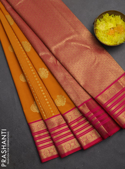 Semi kanchipuram silk saree mustard yellow and pink with allover zari weaves & buttas and zari woven border