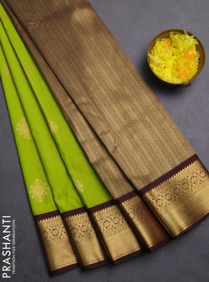 Semi kanchipuram silk saree light green and coffee brown with zari woven buttas and zari woven border